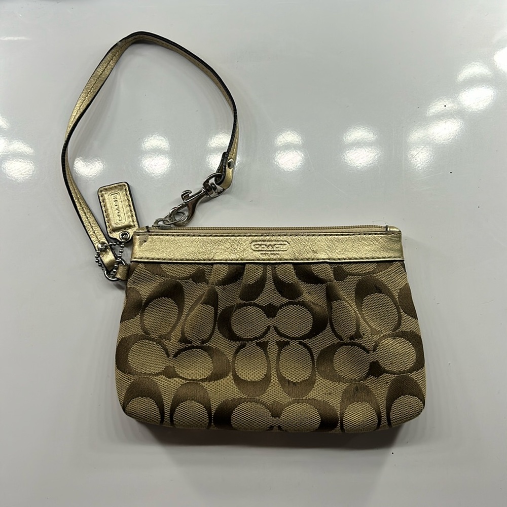 Signature coach wristlet